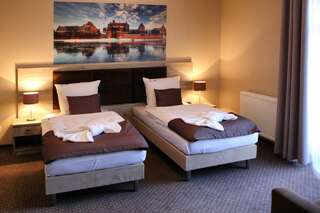 Отель Hotel Piast w centrum Мальборк Двухместный номер Делюкс с 1 кроватью или 2 отдельными кроватями-1