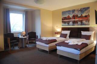 Отель Hotel Piast w centrum Мальборк Двухместный номер Делюкс с 1 кроватью или 2 отдельными кроватями-5